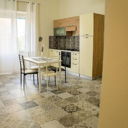 Janas Apartment Porto Torres Bagian luar foto